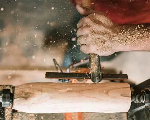 Custom Carpentry — Floor-to-Ceiling Ash Bookcase Wall